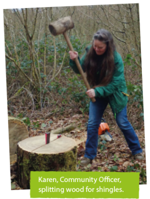 Karen, Community Officer splitting wood for shingles